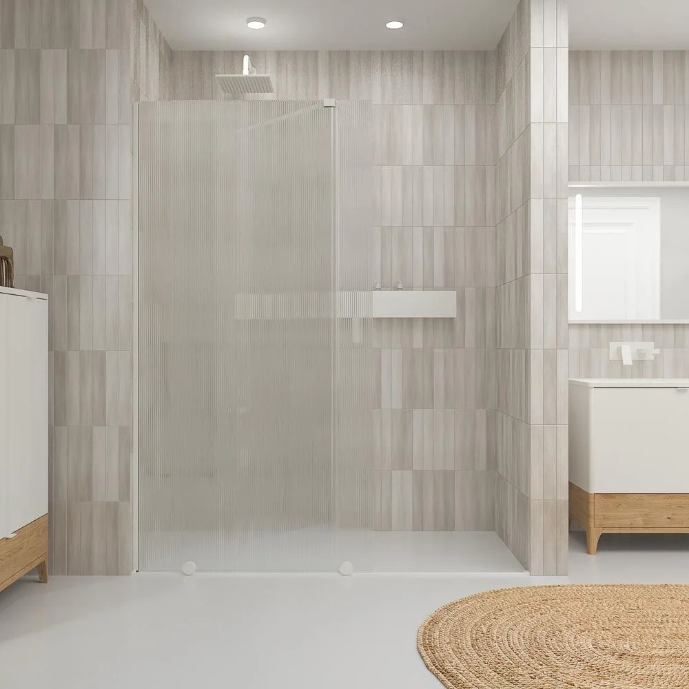 Paroi de douche ANDREA façade 1 fixe- 1 porte coulissante VERRE RAINURÉ roue inférieure. Finition BLANC MAT