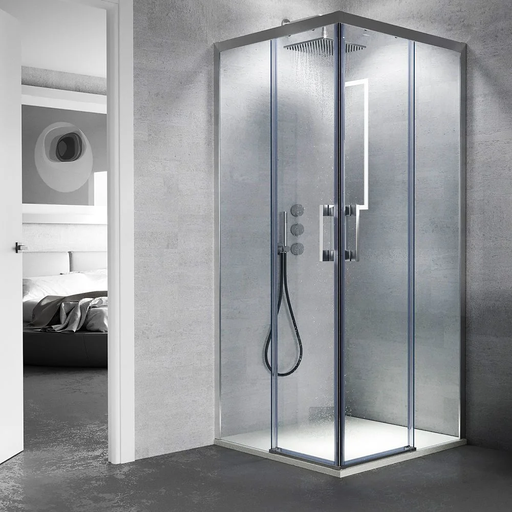 Cabine de douche carrée FLARE ouverture angulaire 2 fixes-2 portes coulissantes. Pas de profil inférieur. Avec traitement anti-calcaire. Finition CHROME BRILLANT